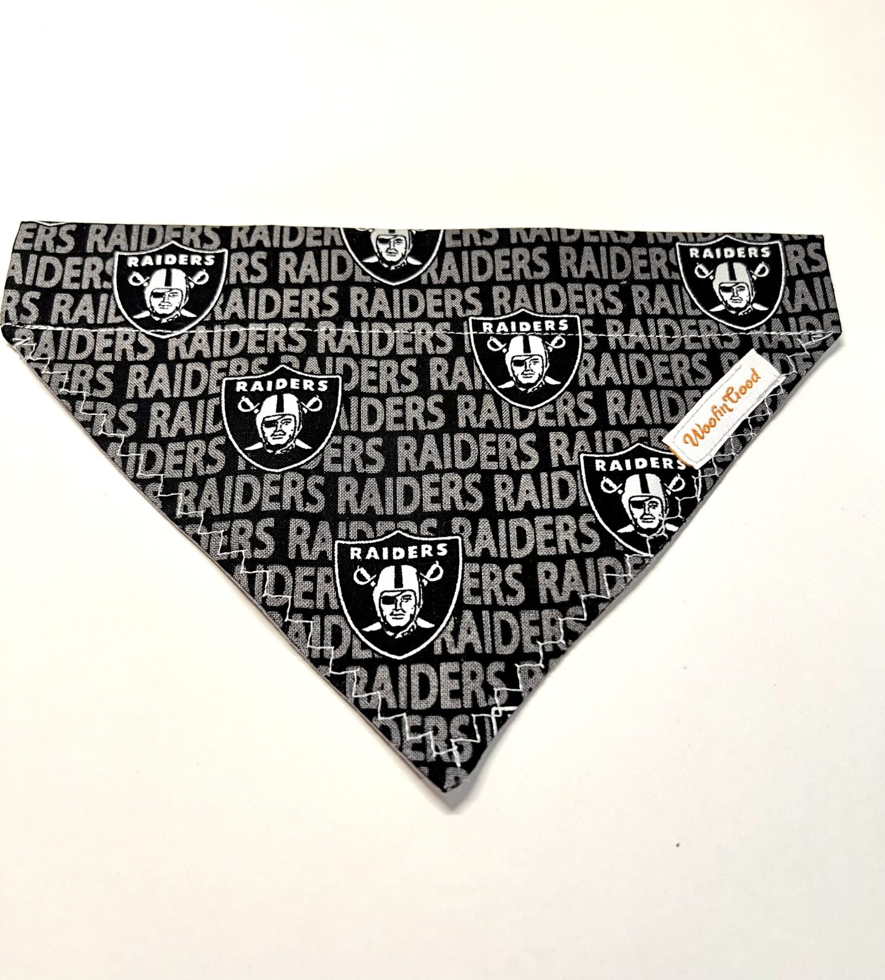 Oakland Raiders bandana with logo and text on a white background